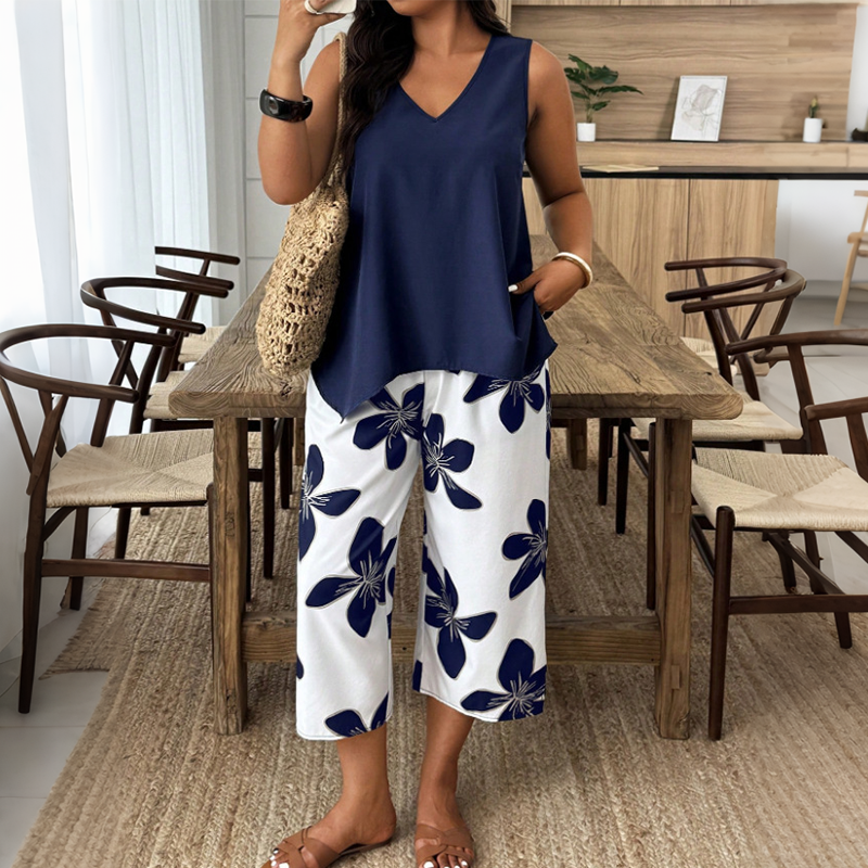 Marissa - Top asimmetrico soft touch e coordinato capri floreale