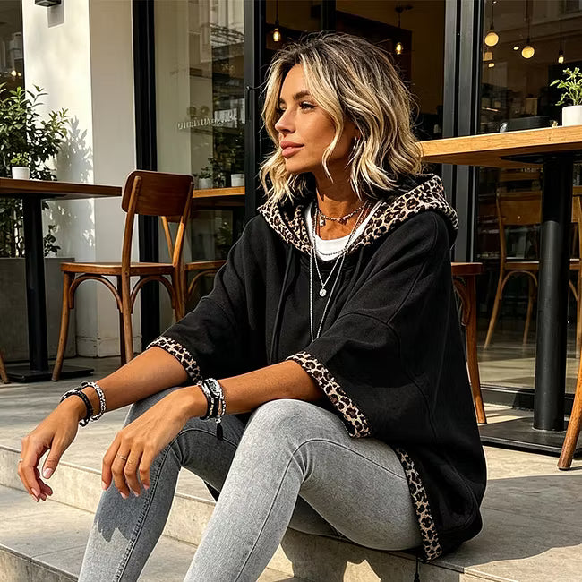 Aliz - Felpa con cappuccio, maniche a pipistrello e bordo leopardato