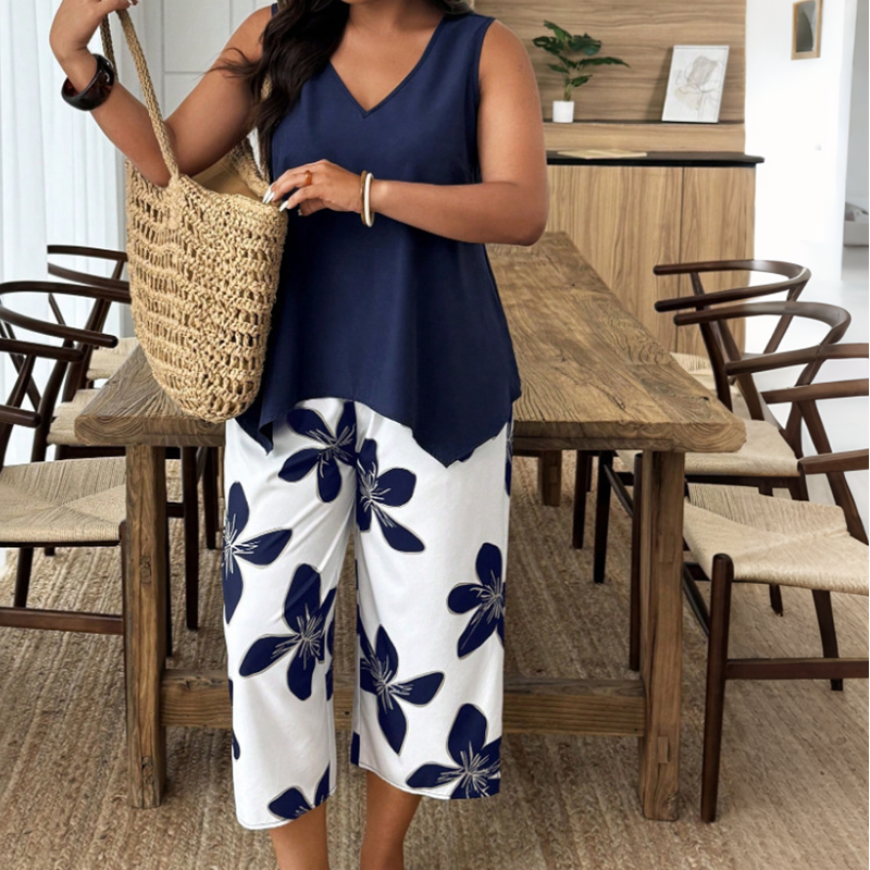 Marissa - Top asimmetrico soft touch e coordinato capri floreale