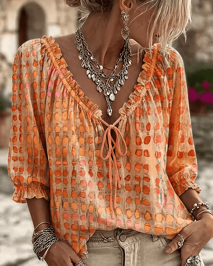 Araminta - Blusa in pizzo morbido con scollo a V