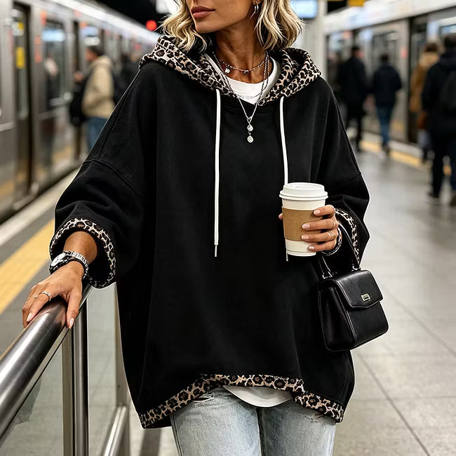 Aliz - Felpa con cappuccio, maniche a pipistrello e bordo leopardato