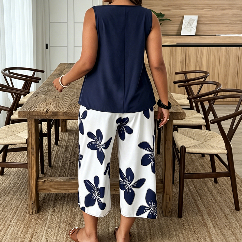 Marissa - Top asimmetrico soft touch e coordinato capri floreale