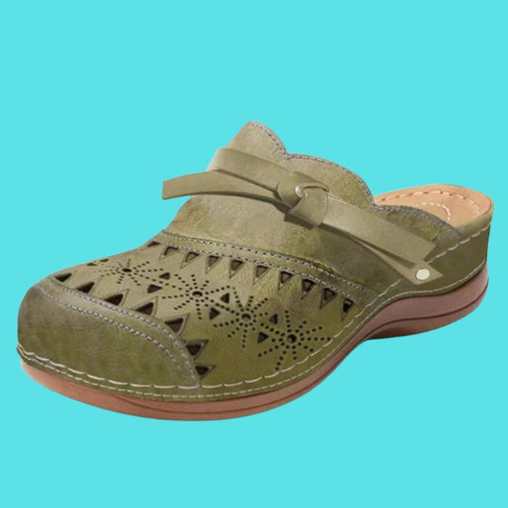 Aerina - Mules imbottite a tacco basso