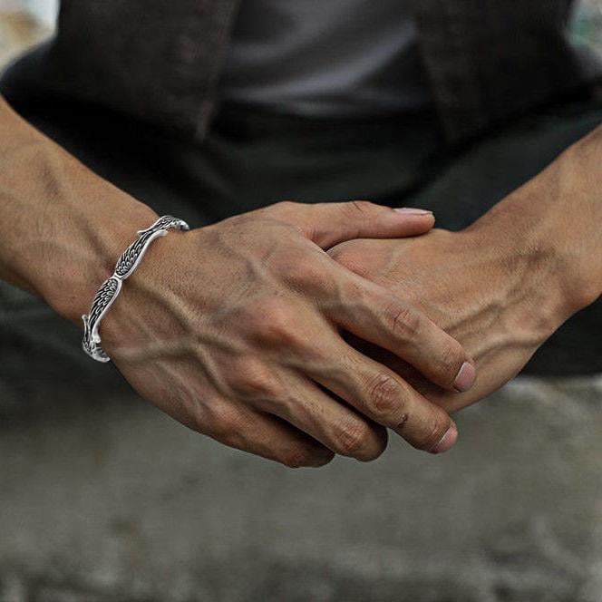 Raveya - Bracciale con ali d'angelo lucide