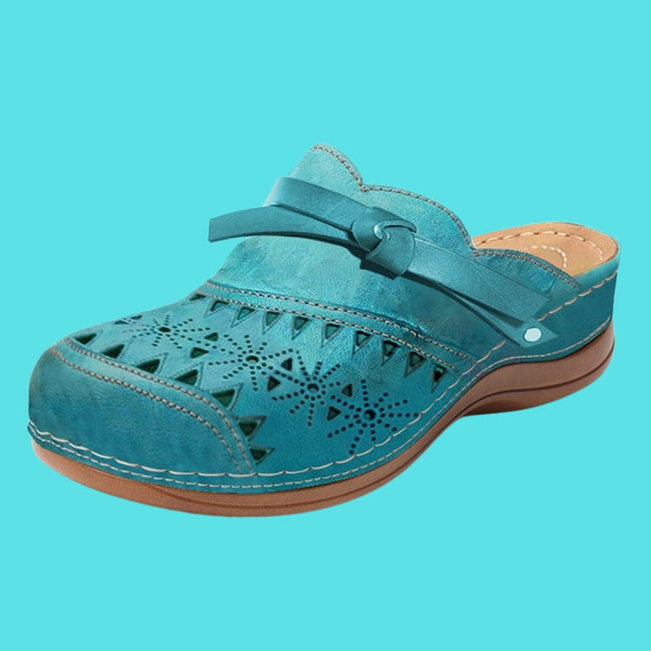 Aerina - Mules imbottite a tacco basso