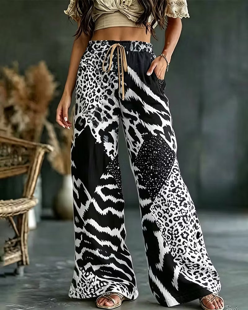 Elfrida - Pantaloni a gamba larga in patchwork leopardato, morbidi al tatto