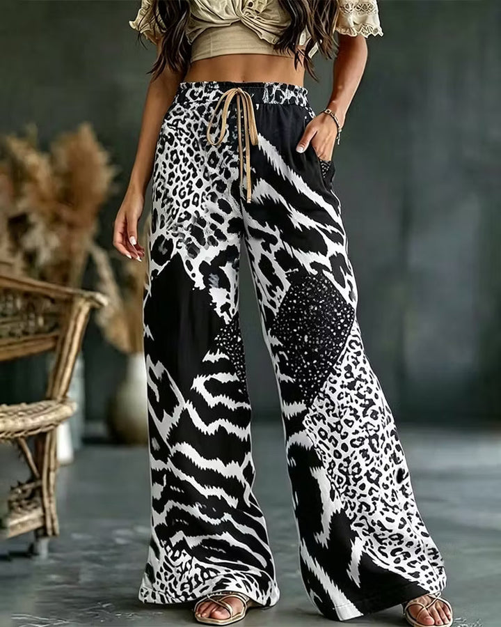 Elfrida - Pantaloni a gamba larga in patchwork leopardato, morbidi al tatto