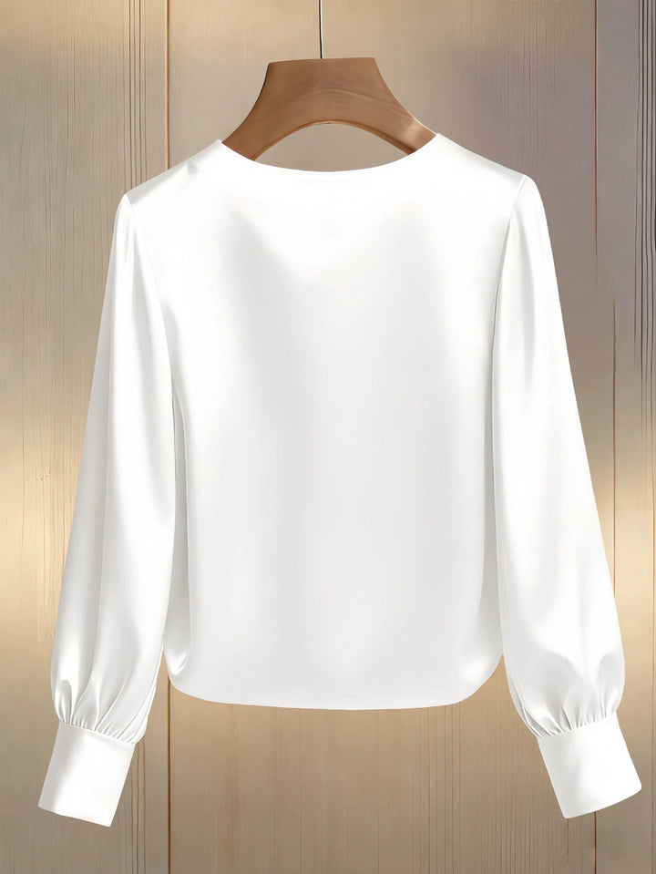 Avara - Blusa elegante in perle