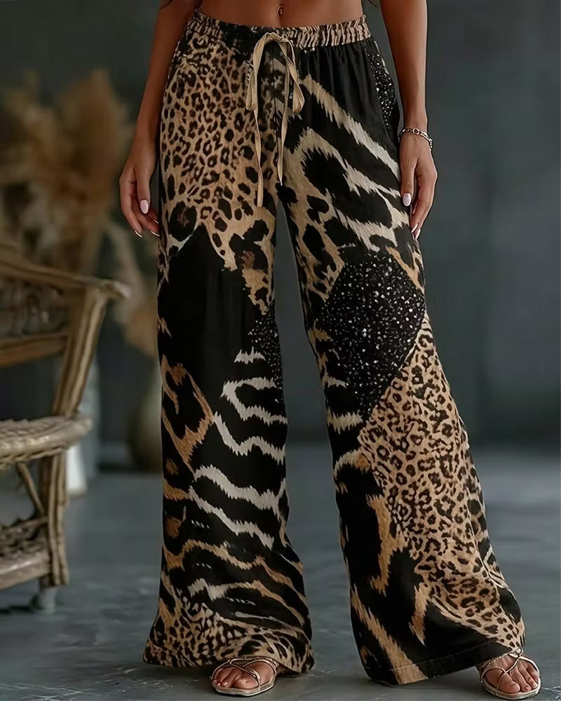 Elfrida - Pantaloni a gamba larga in patchwork leopardato, morbidi al tatto
