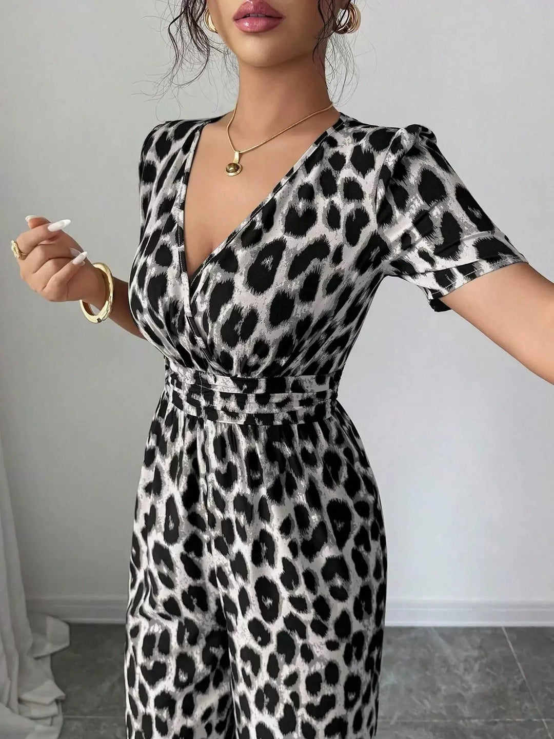 Eveliora - Tuta chic con stampa animalier