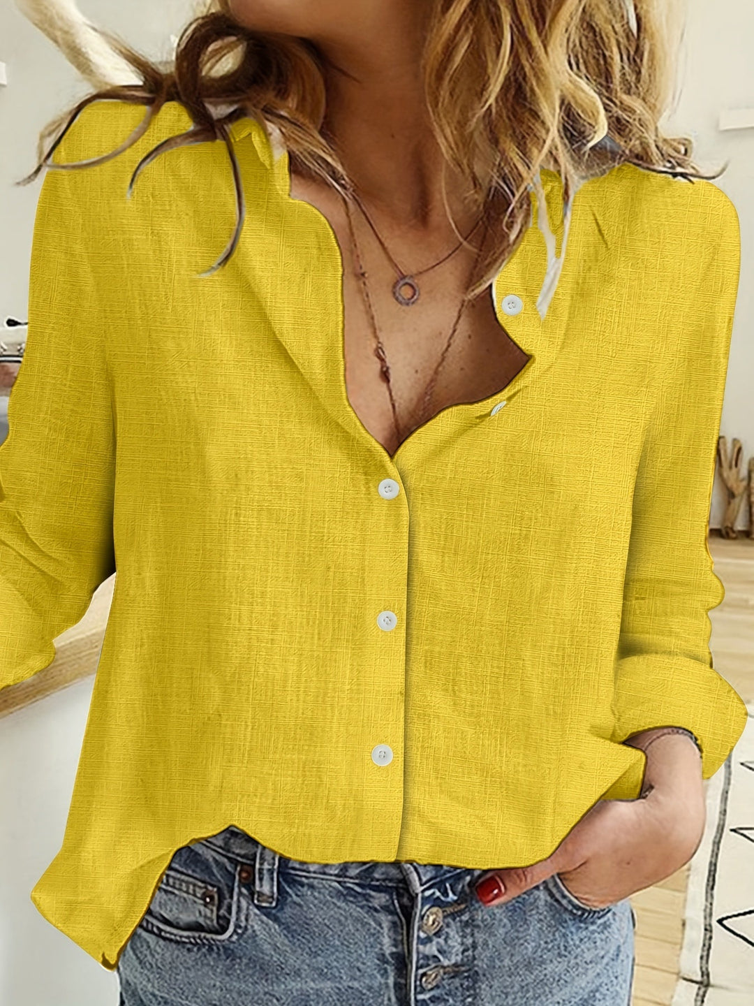 Rowena - Blusa trasparente con frange